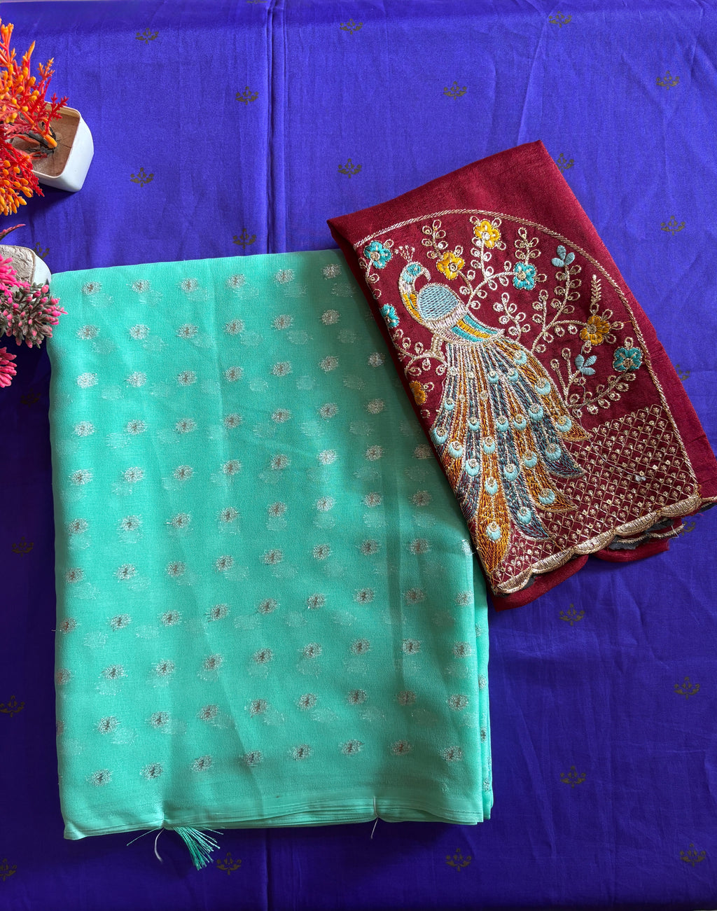 Aqua Charm Chiffon Saree with Wine Red Peacock Blouse